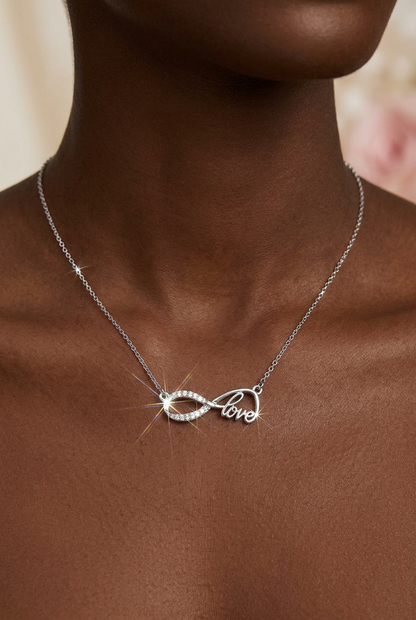 Eternal Bond: Silver-tone Cursive "Love" Infinity Rhinestone Pendant  Necklace