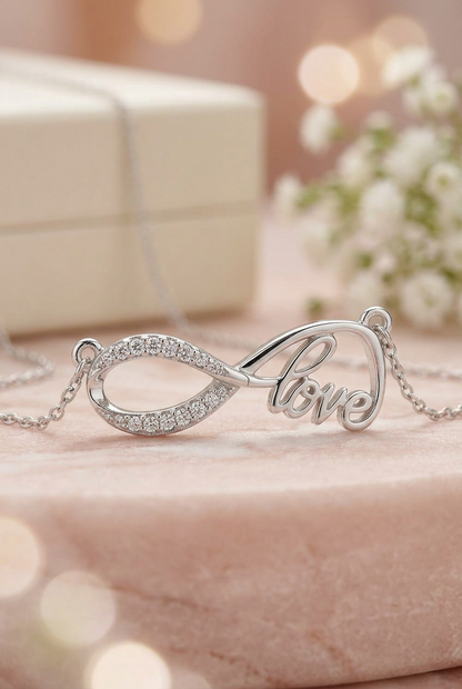 Eternal Bond: Silver-tone Cursive "Love" Infinity Rhinestone Pendant  Necklace