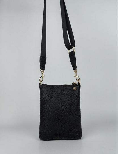 Orelia rose-pattern cross-body women handbag with adjustable strap and gold accents.