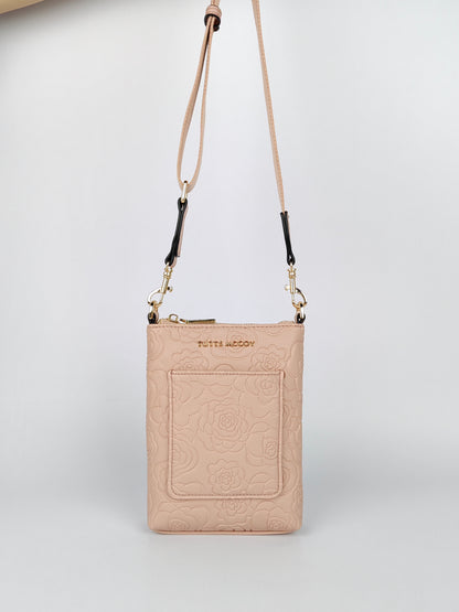 Orelia rose-pattern cross-body women handbag with adjustable strap and gold accents.