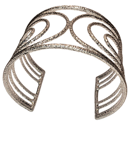 Women’s gold jewelry collection – sleek silver metal bracelet with modern polished finish.