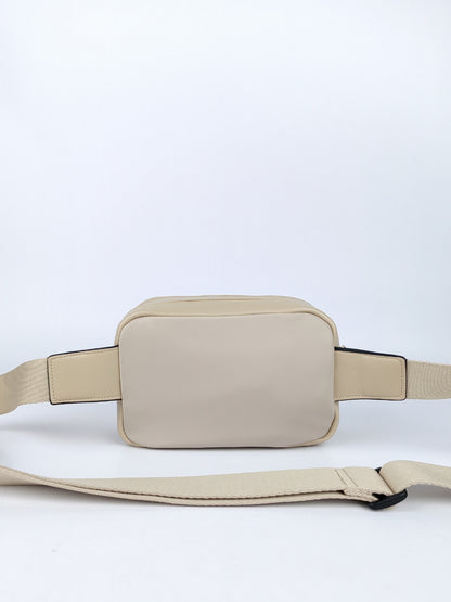 Chevron-pattern Martha Fannie Pack with gold zippers – elegant cross-body women handbags.